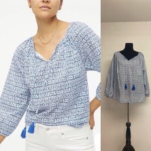 J. Crew. Blue and white tasseled blouse